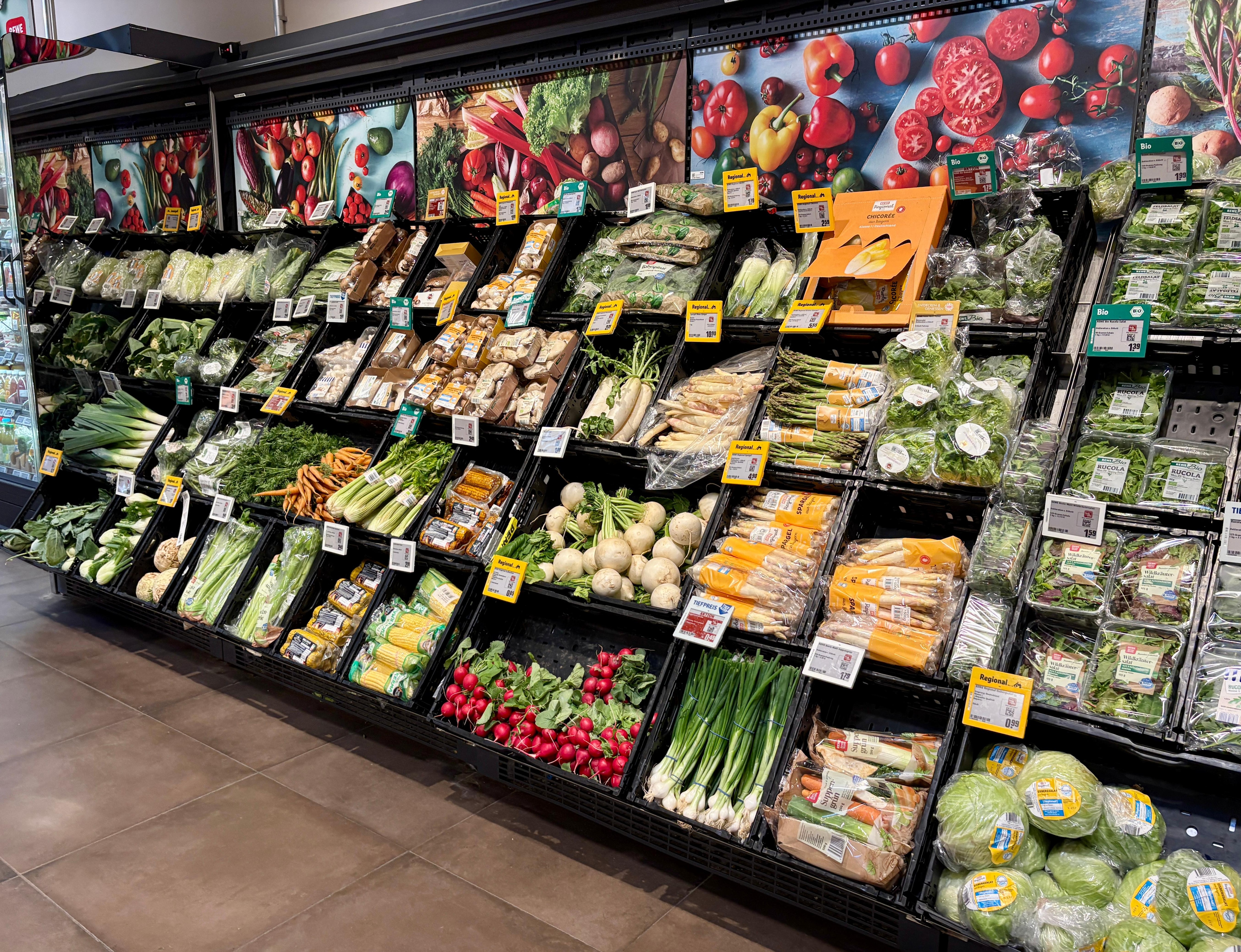 REWE is a nice grocery story next door with a good bakery, take-away hot food bar, meats, cheeeses, and beautiful fruits and vegetables.