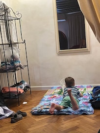 Master Walk-closet with storage and curtains, so our toddler slept and played there.