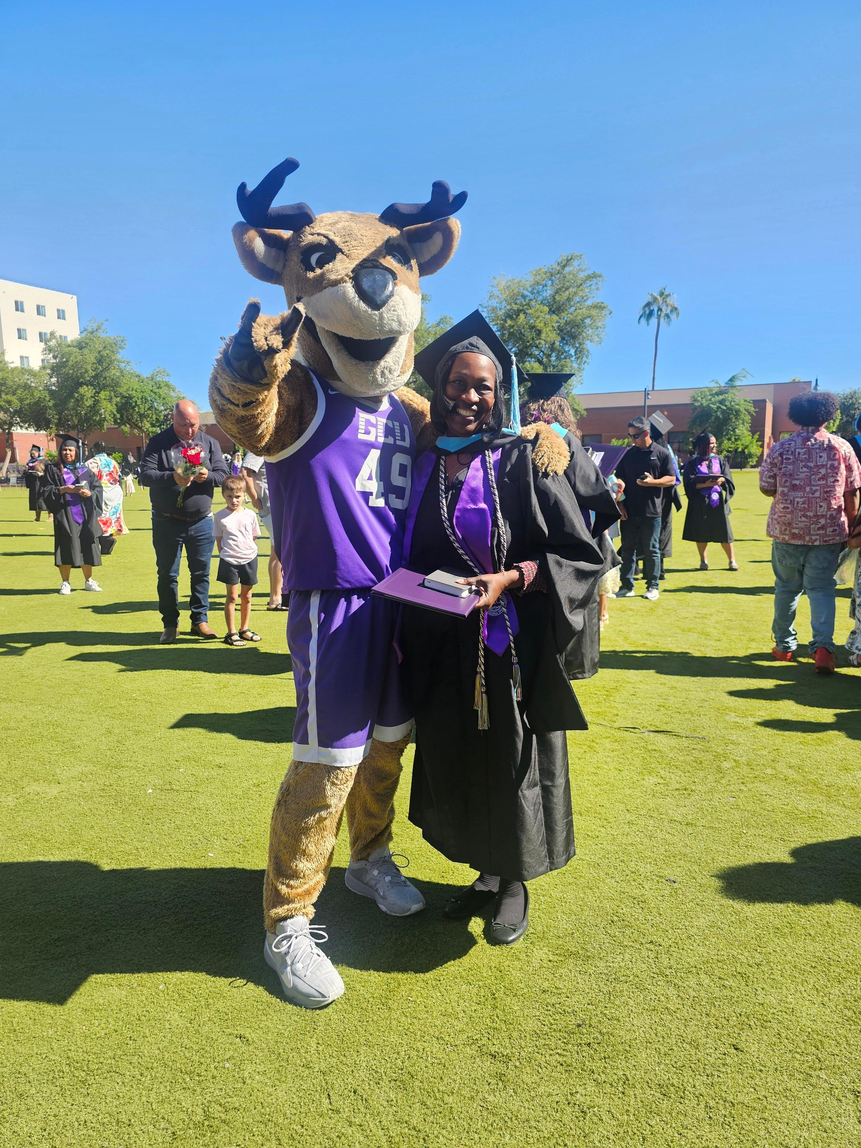 Me on graduation day with the Antelope, our mascot 