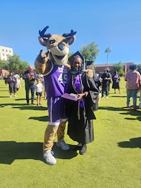 Me on graduation day with the Antelope, our mascot
