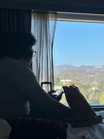 Looking at the Hollywood sign while relaxing in the comfy beds