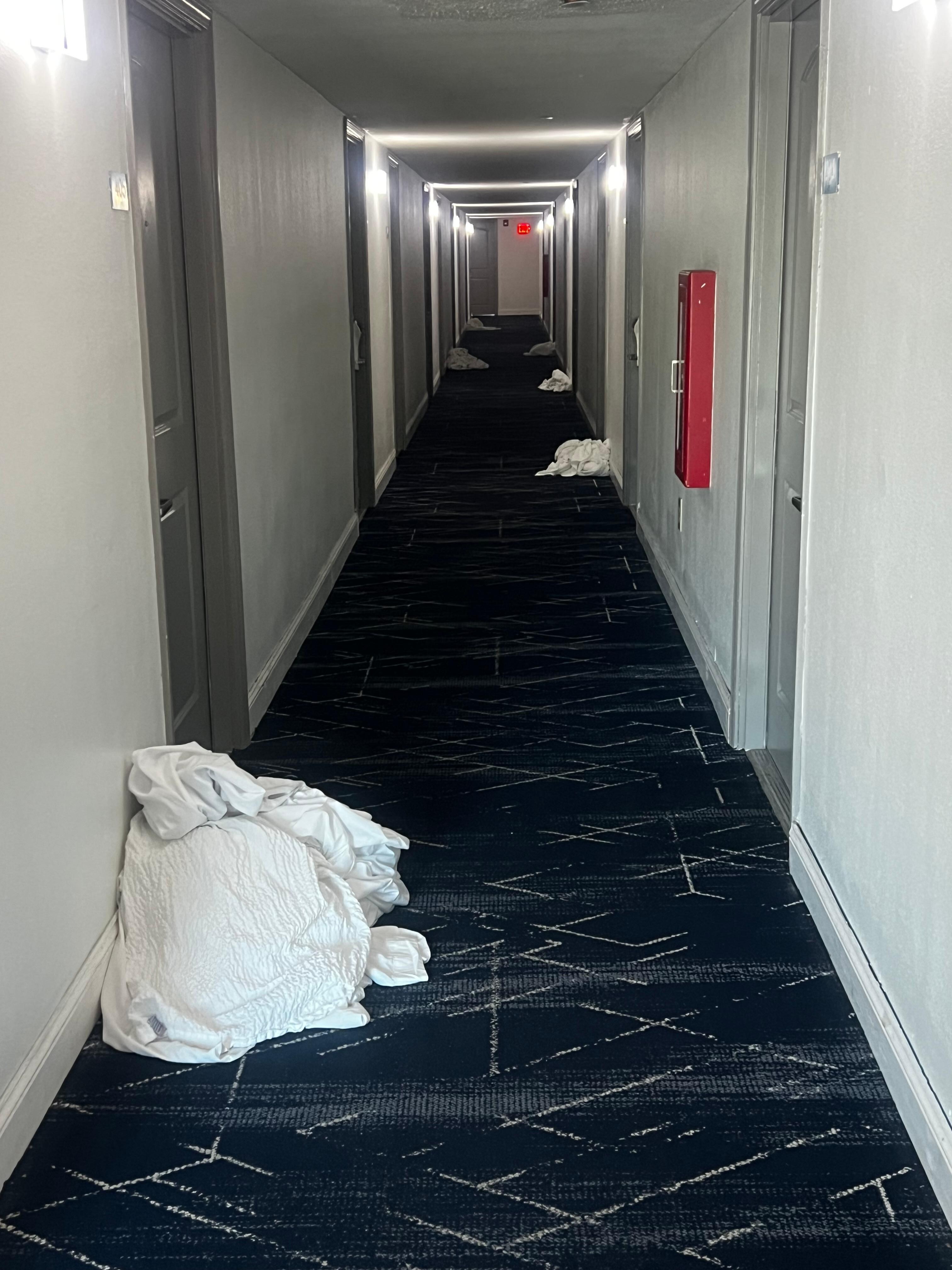Dirty towels in the hallway for days