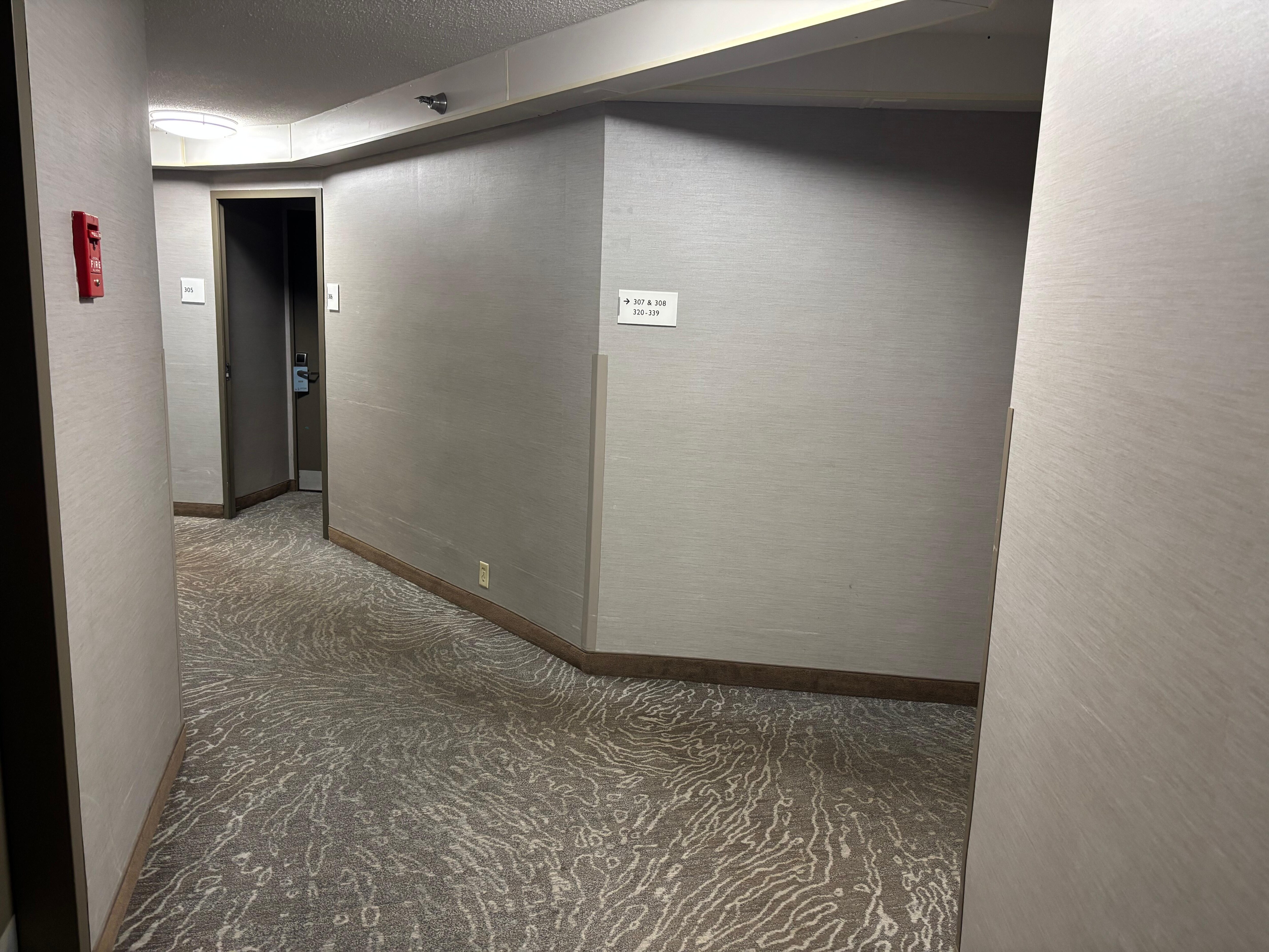 Carpet issues like this were common in the hallway. 