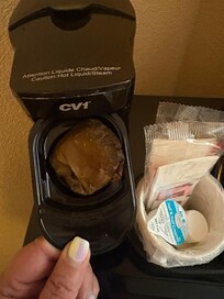 Dried used coffee filter in pot