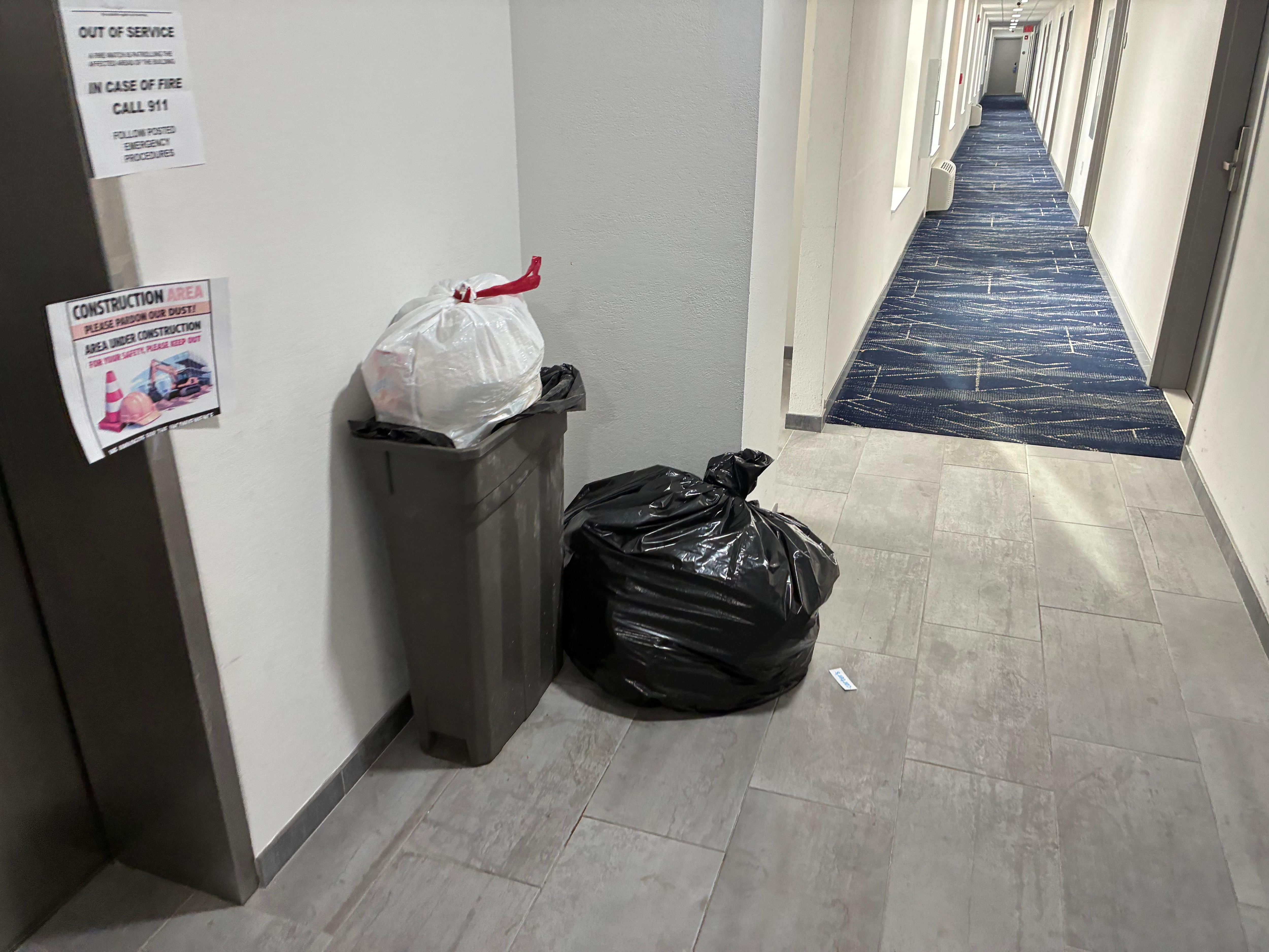 By elevator on 2nd floor