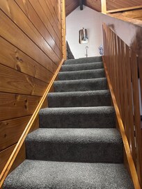 Upstairs to the two single beds - my son loved it up there!