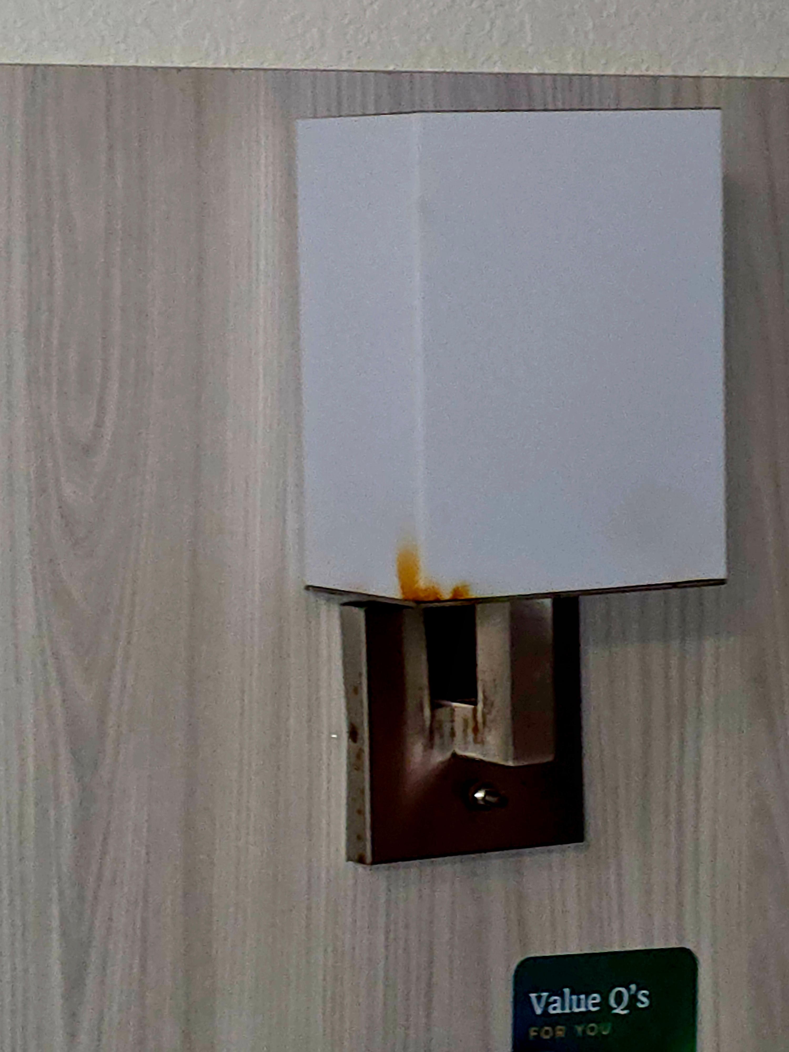 Rusty and dirty wall lamp