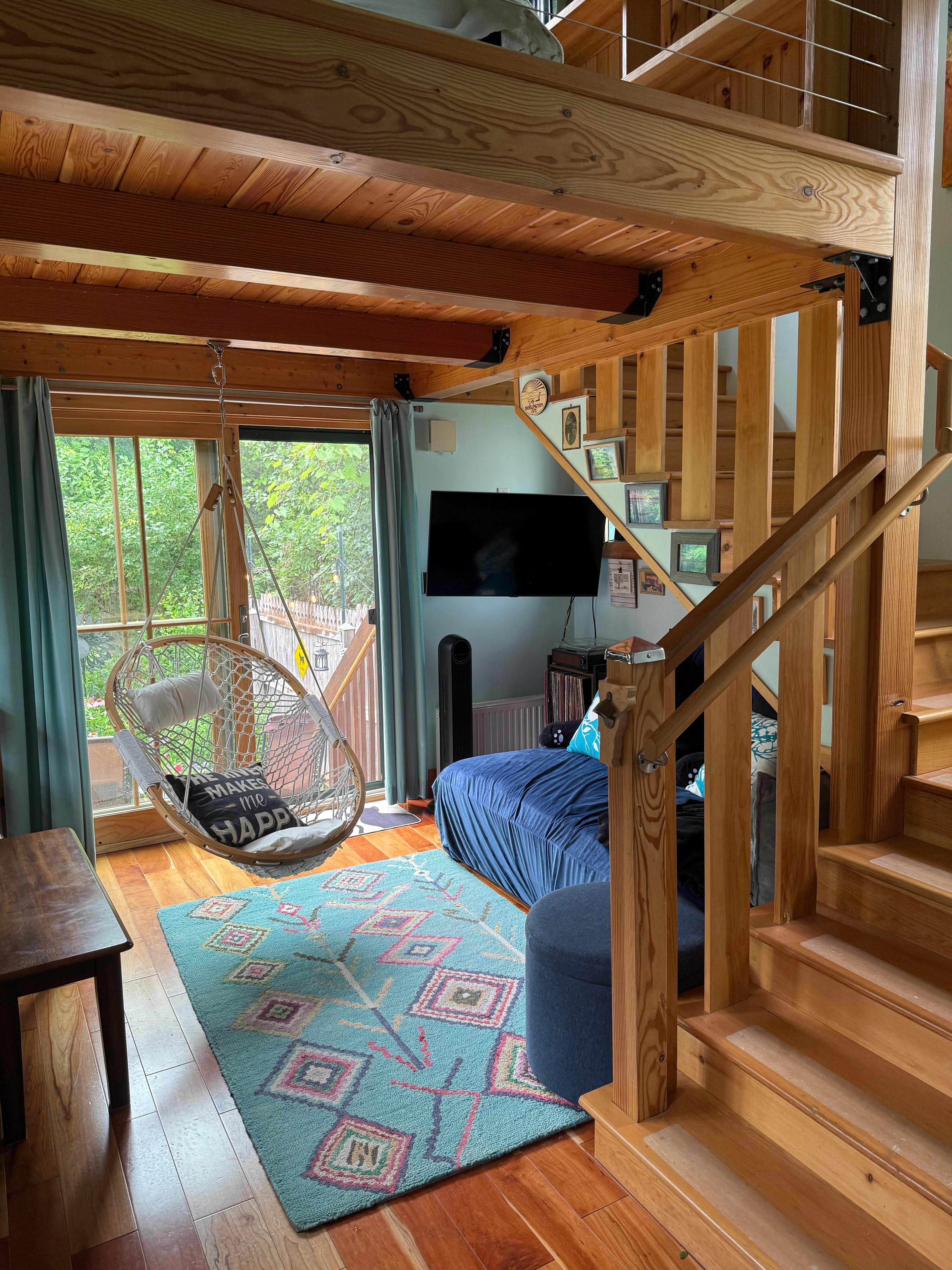 Inside nook and swing with French doors leading to the garden