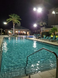 This is only half of the pool. It is a U shape, with stairs at one end and a gently sloped shallow end, making it easy for mobility challenged to enter it. There are also powered lifts into the pool and benches in the water.