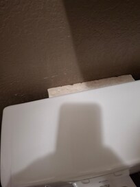 Block holds toilet up level
