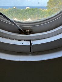 Cracked window frame.