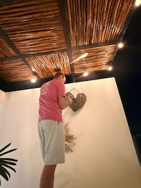 My husband tending to our adopted kids