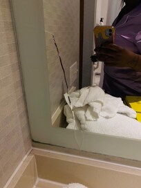 Crack in bathroom mirror