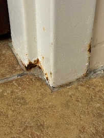 Gross stuff on bathroom door frame