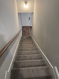 Stairs to both bedrooms upstairs