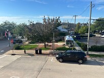Directly across the street, this cute donut, ice cream place.