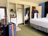 Microwave is yellow, refrigerator is rusted