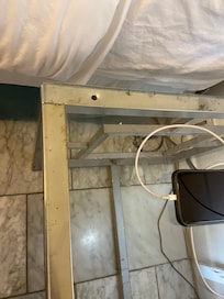 Night stand by the bed