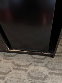 Below refrigerator.