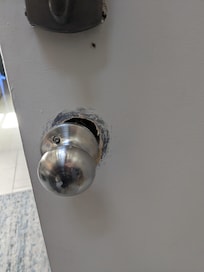 Inside unit. The knob was not secured properly to the door.