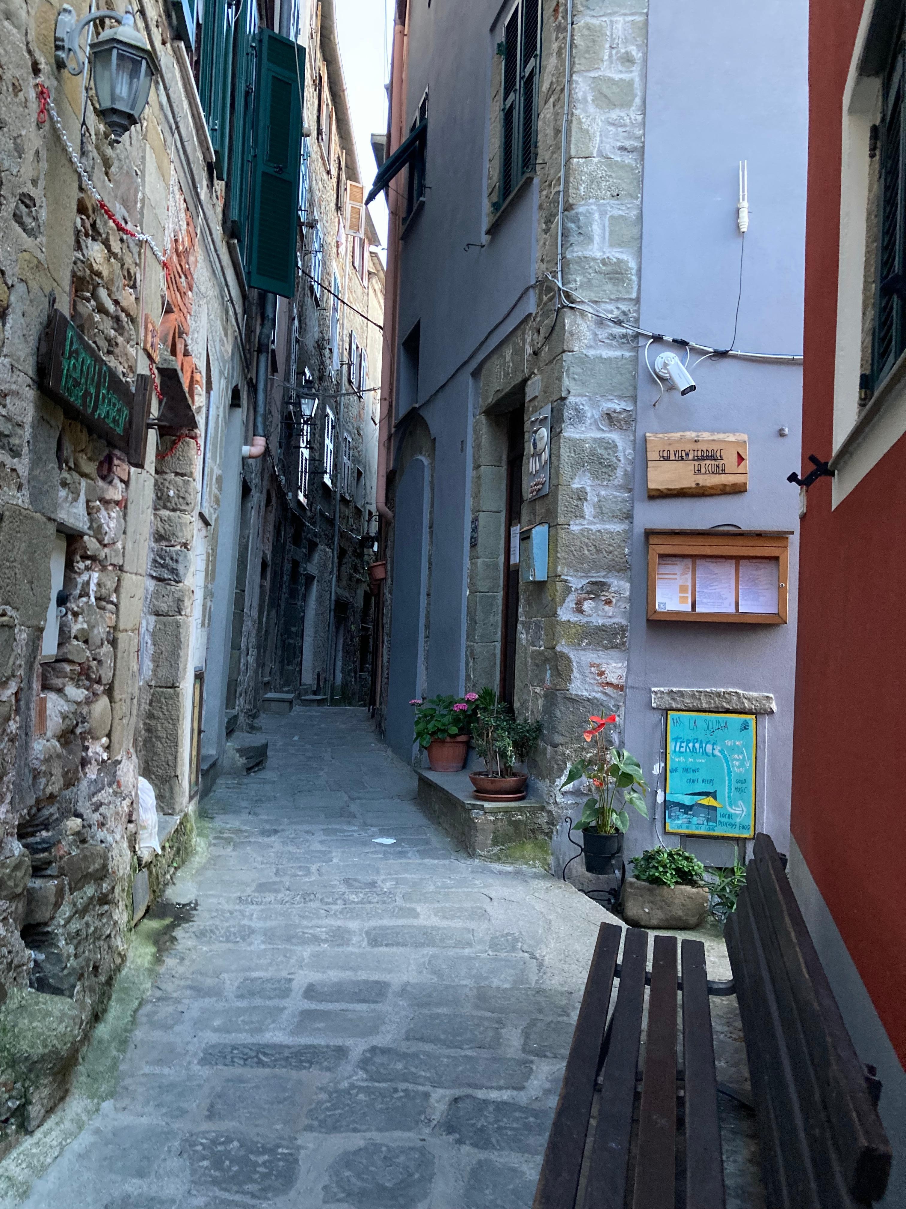 Entrance to rooms on right, check in to the left at La Scuna bar