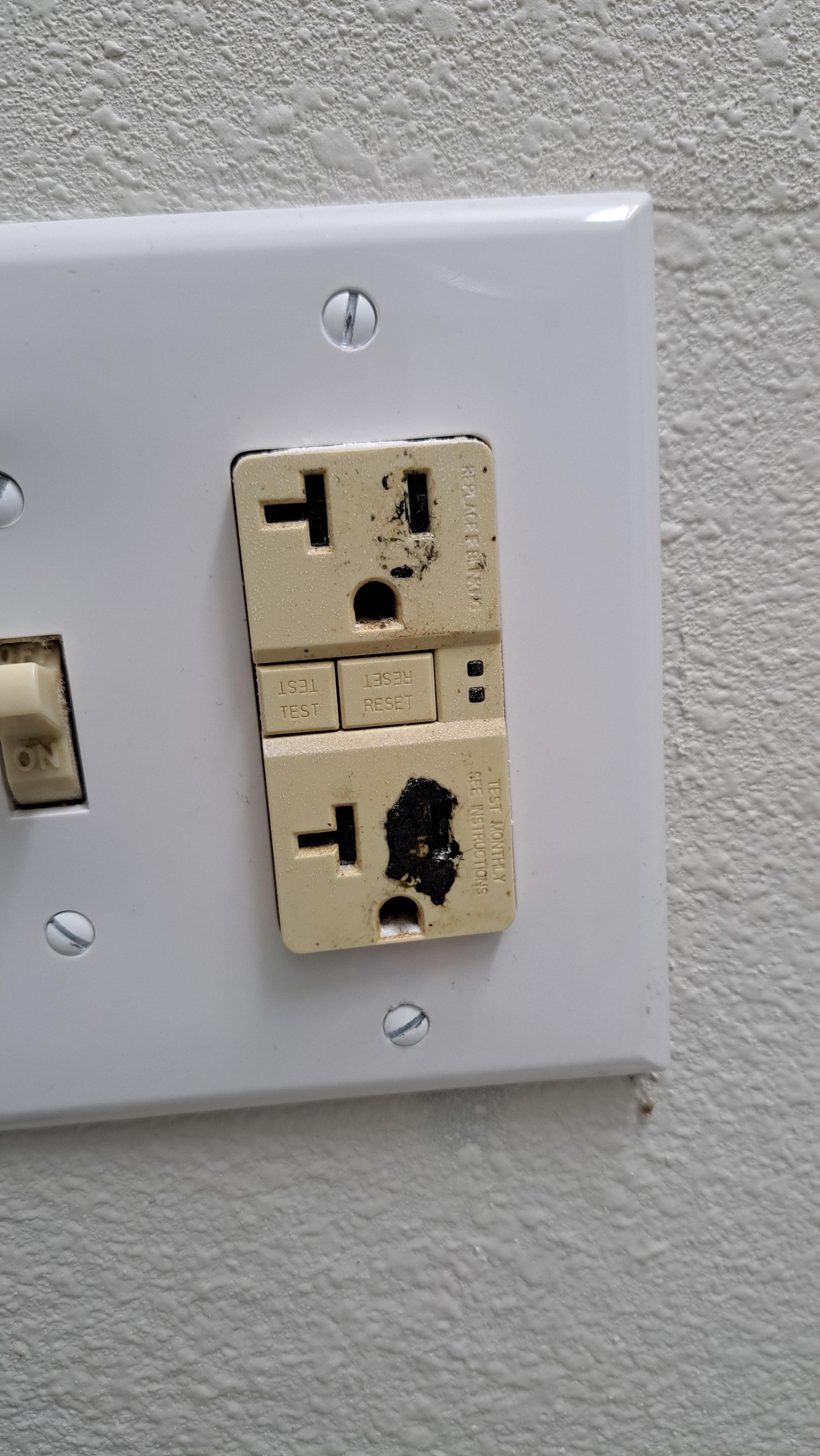 Plug in the bathroom, looks like something was melted into it