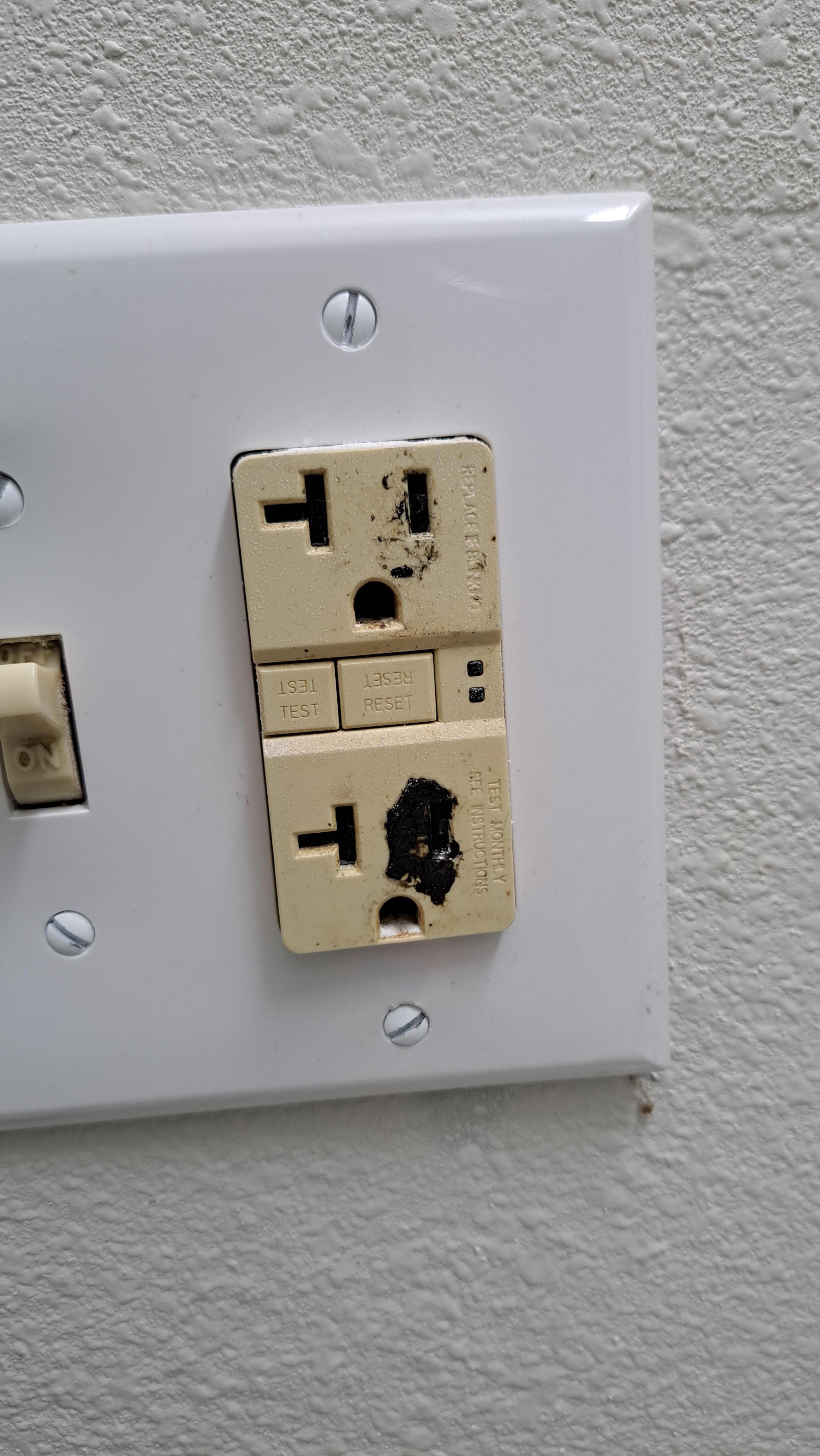 Plug in the bathroom, looks like something was melted into it