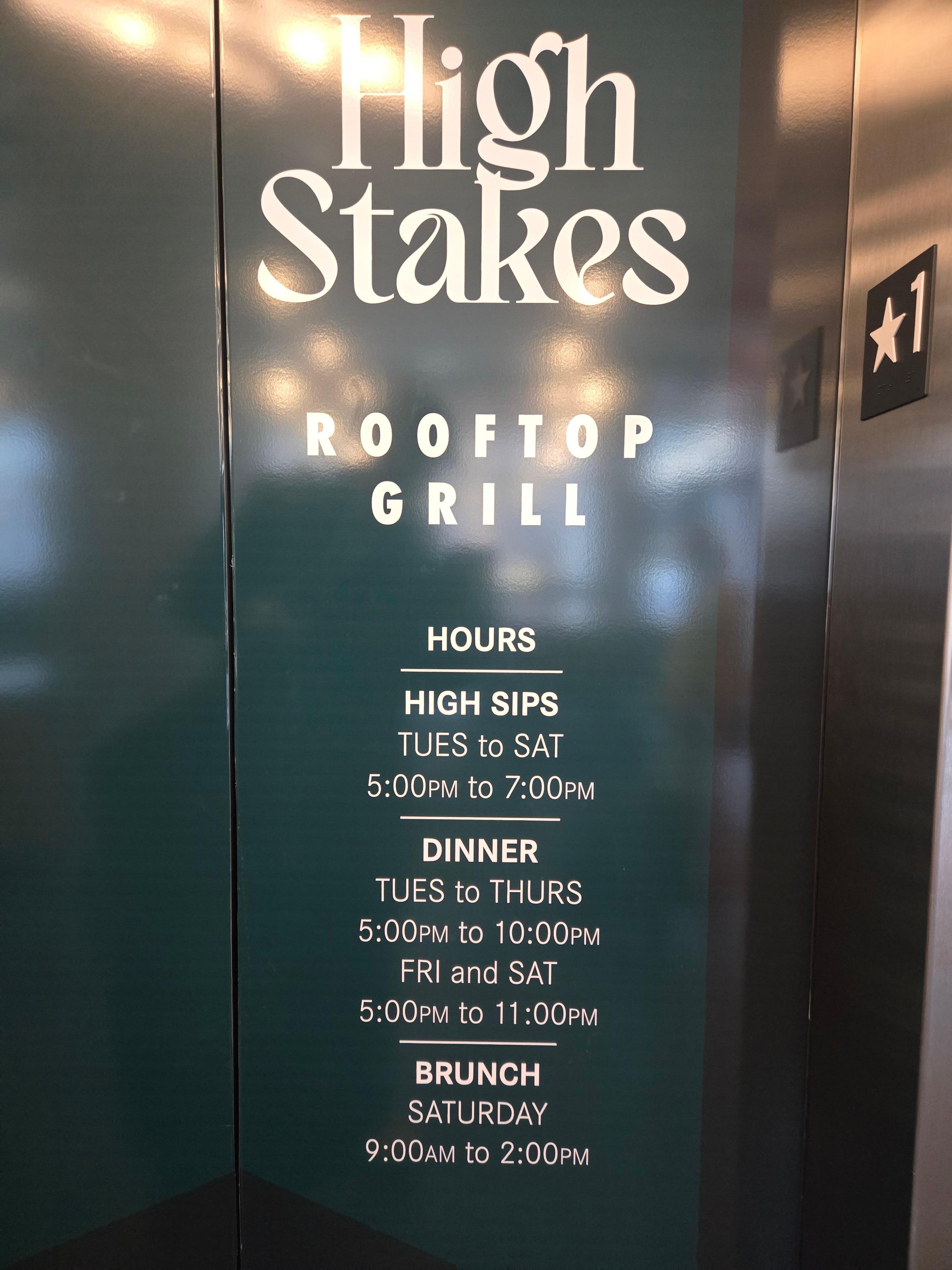 Permanently affixed sign near main elevator