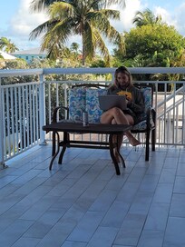 Relaxing on the upstairs patio in the morning.