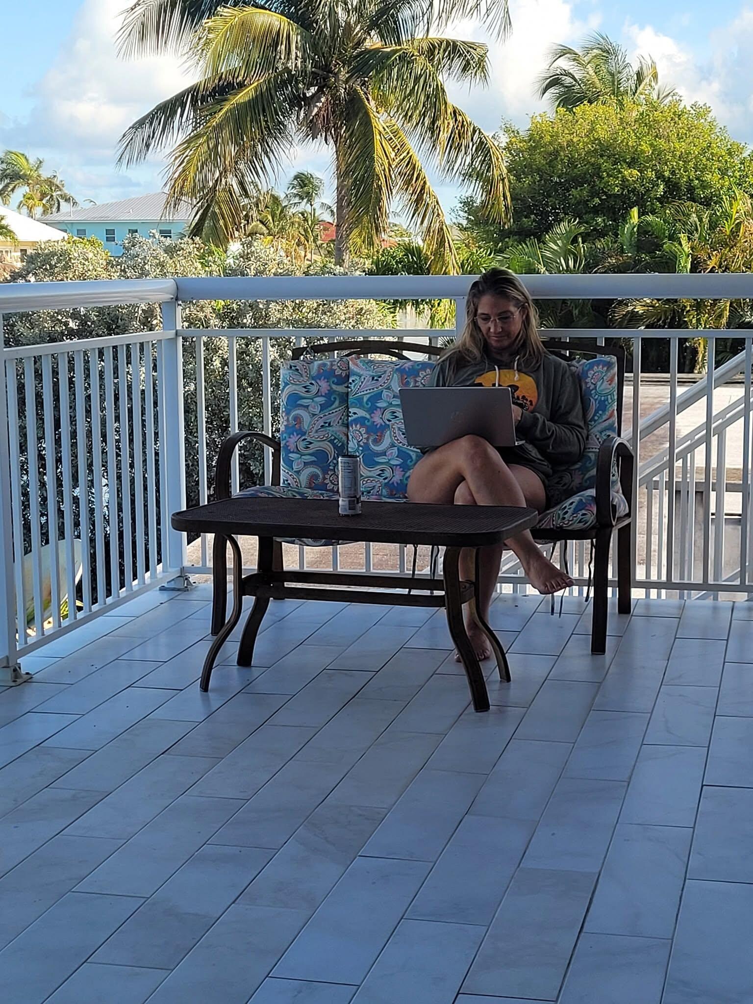 Relaxing on the upstairs patio in the morning.