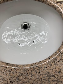 Sink stuffed up black stuff coming up