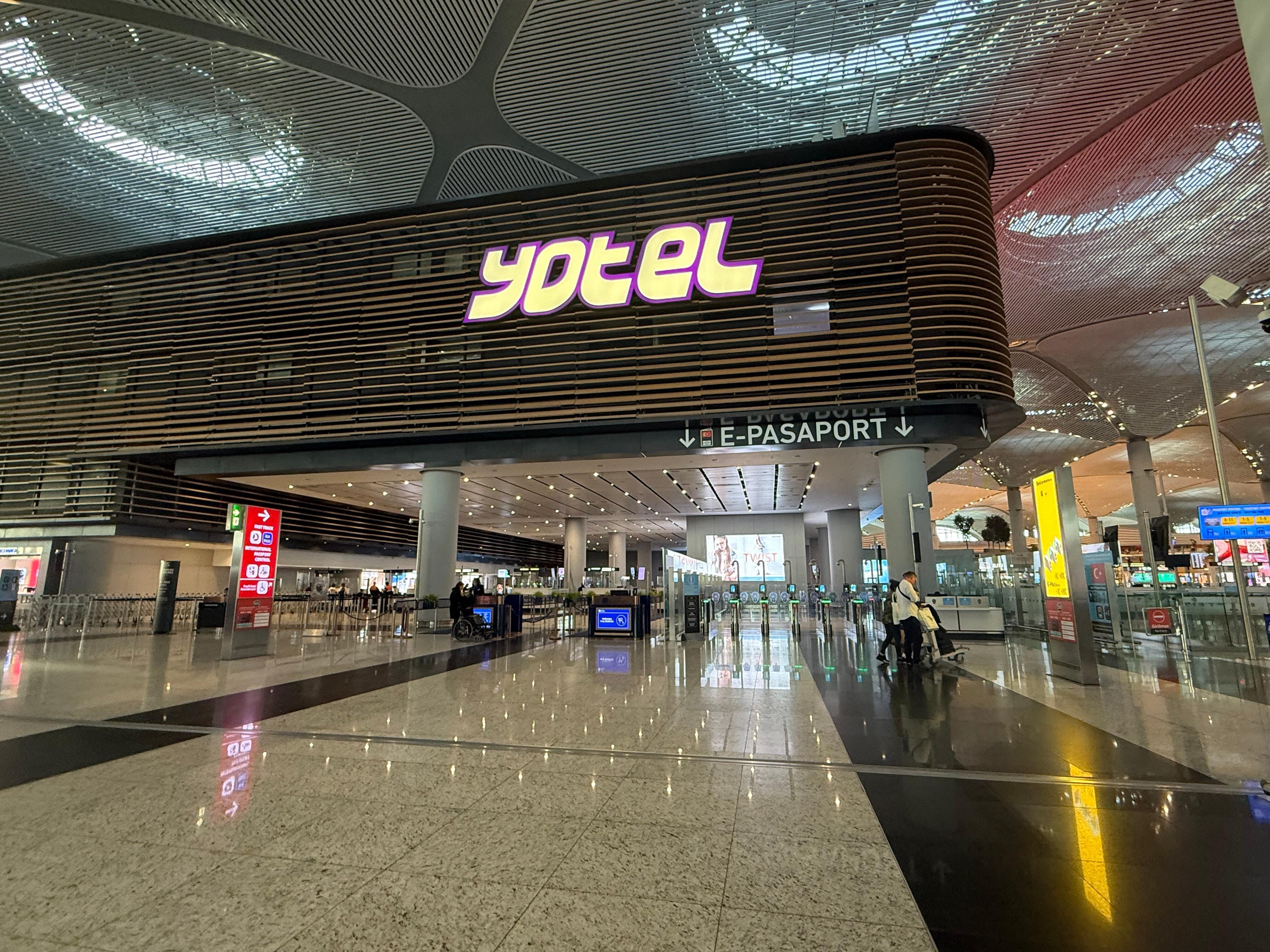 Yotel is after first security check but before passport control 