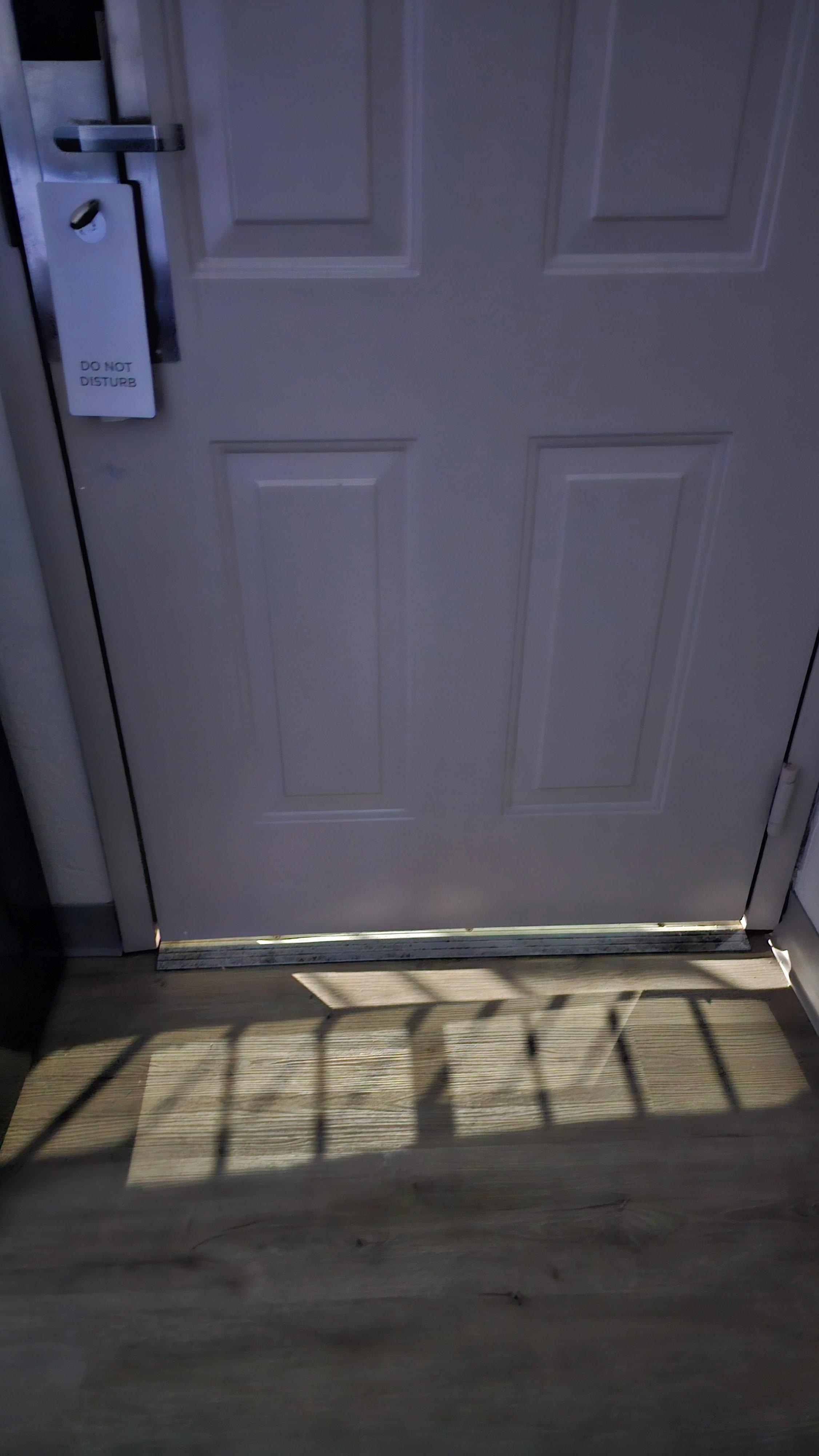 The door gap from inside of the room. 