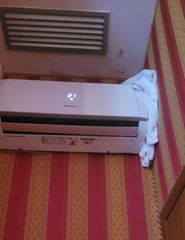 Towels used to reduce airconditioner leaking.