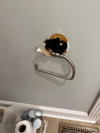 Master bath whole in wall