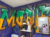 Very spacious half bath with Mardi Gras Mural