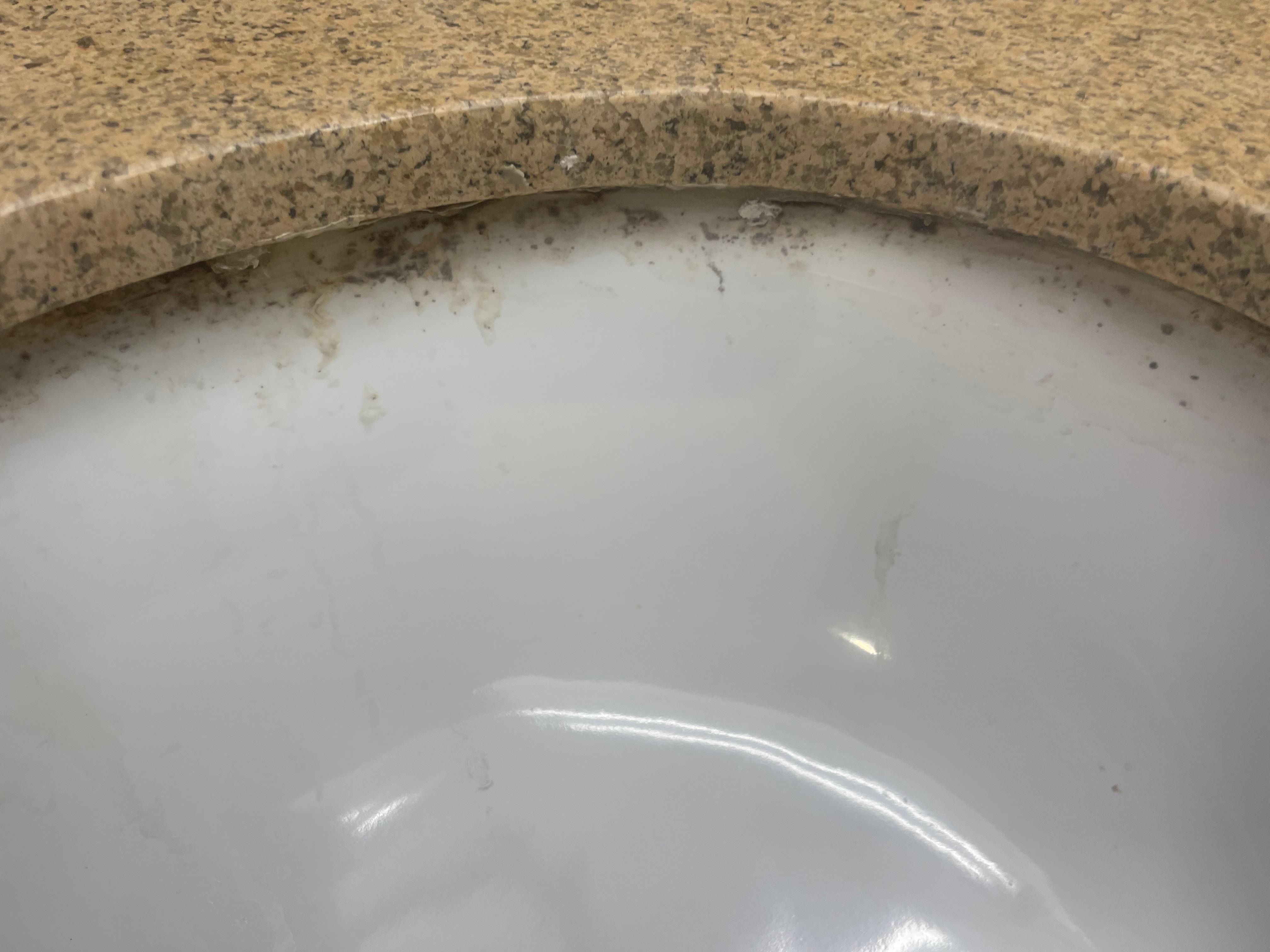 The sink had mold around it. The glue from fixing the sink was loose.