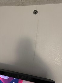 the drywall had a crack in it….and it looks water damaged