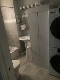 Laundry and bathroom off main bedroom.