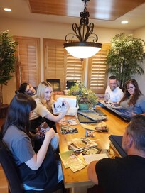 Looking through family photos in the dining room.