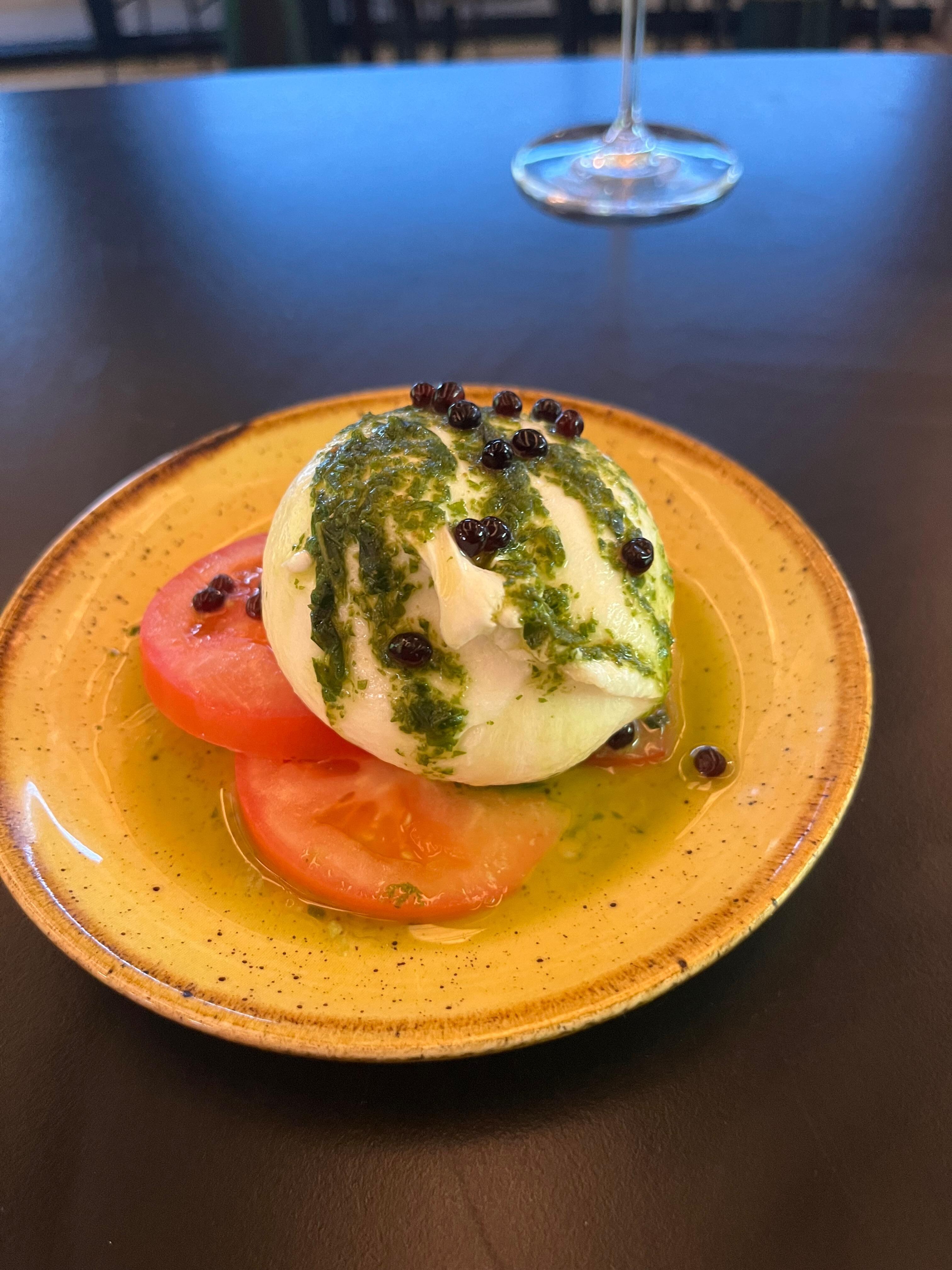 £15.00 for a cats size saucer with 3 slices of tomato and a ball of mozzarella 