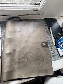Information book dirty stained and dusty