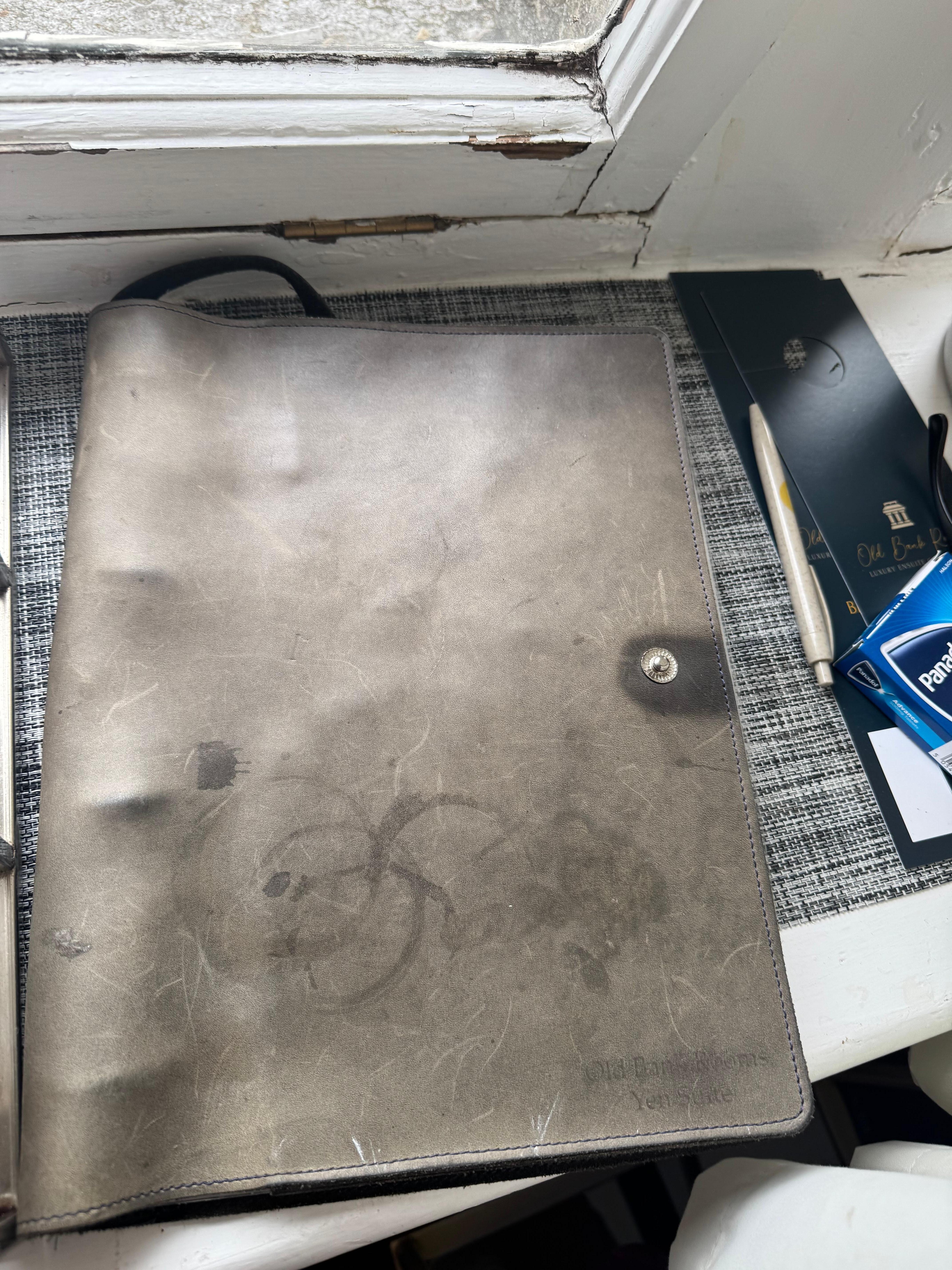 Information book dirty stained and dusty