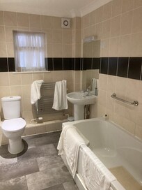 The bathroom was clean but in need of refurbishment particularly on the bath panels and towel rack