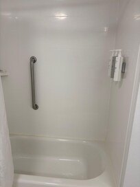 The bar is located too far from the dripping products to give you much chance of catching yourself when you inevitably slip in this shower