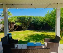 View of the backyard from inside the room.
