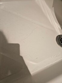 There was hair all over in the shower.