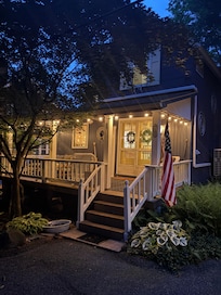 Home in the evening with the porch lights. So welcoming!