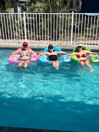 Besties Floating in the Pool