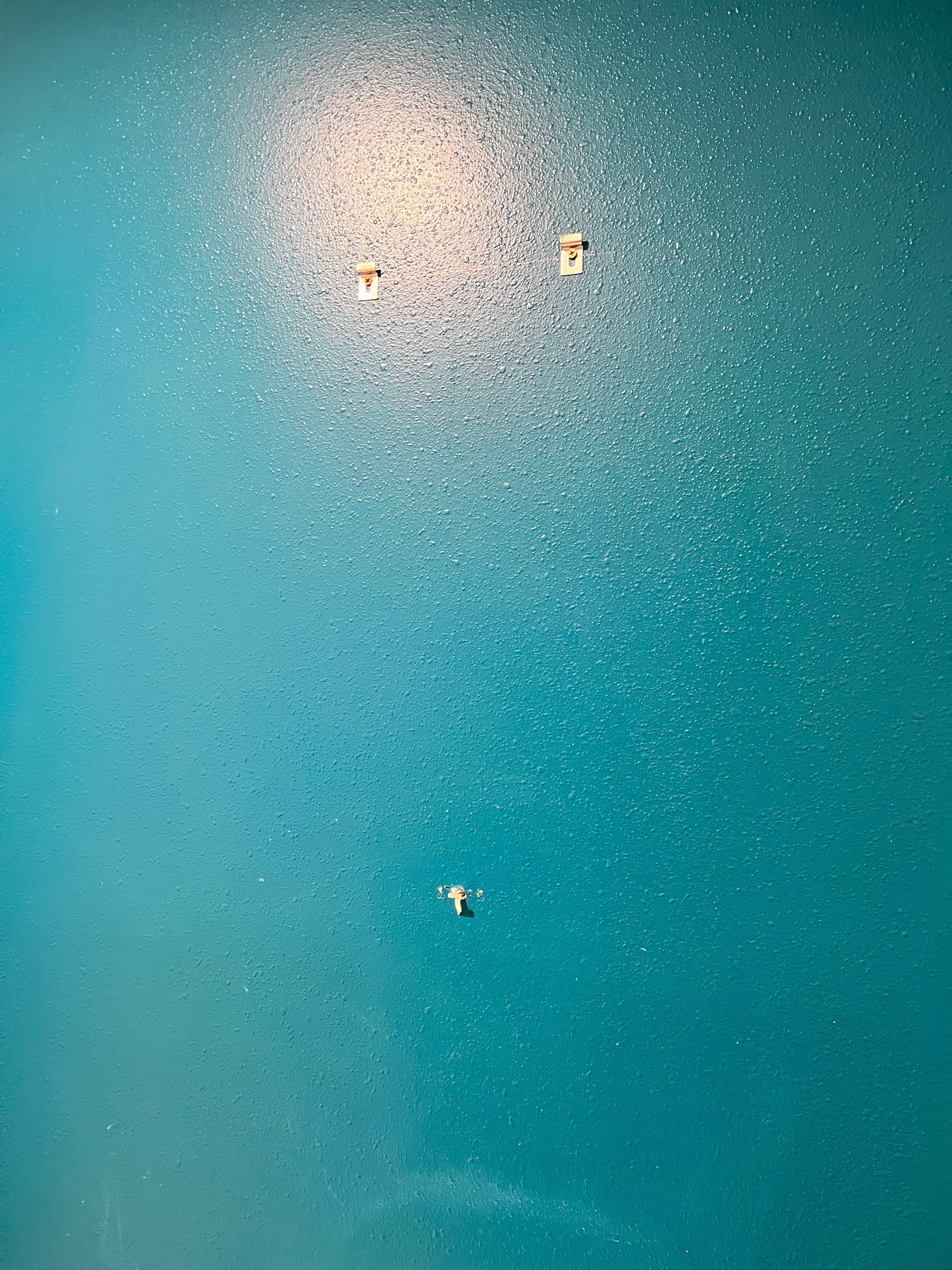 Bathroom wall with holes